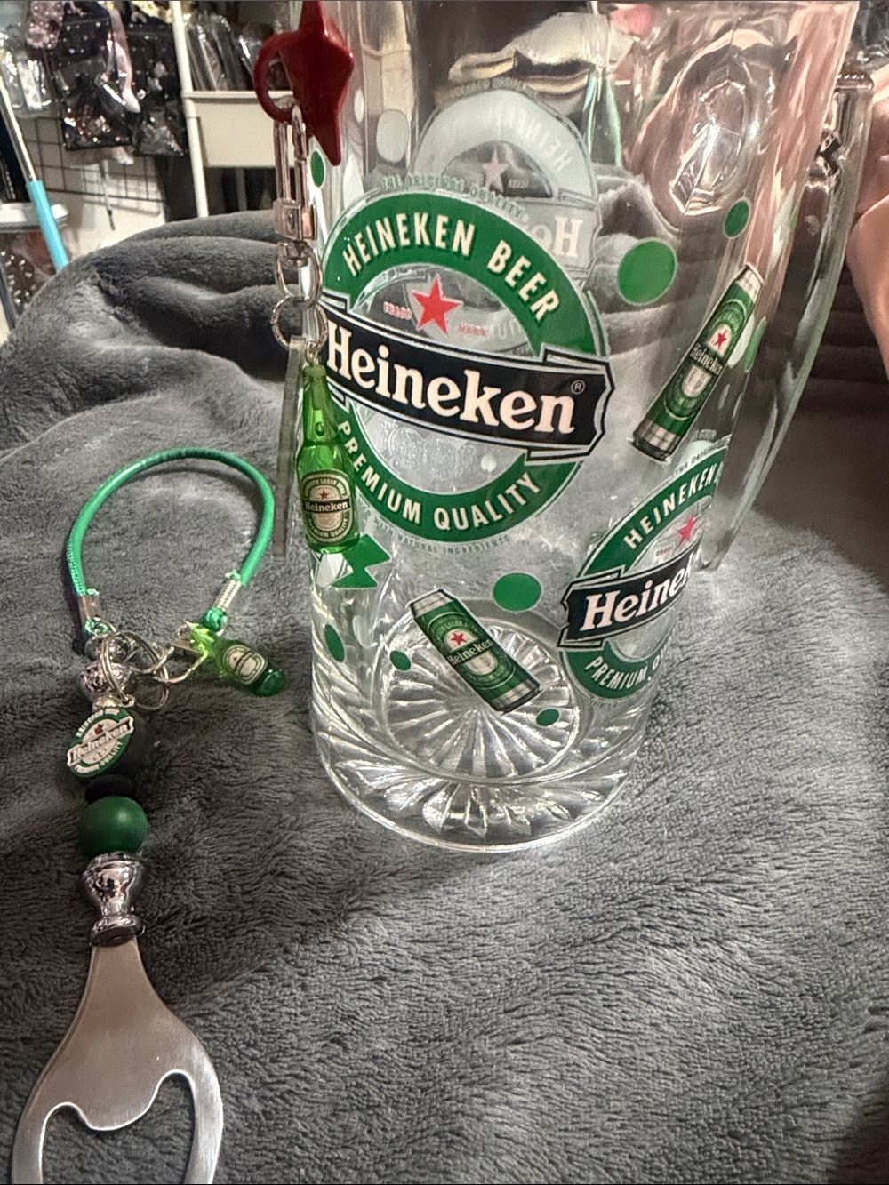 Green Logo Glass Mug with Matching Bottle Opener with Wrist Strap.
